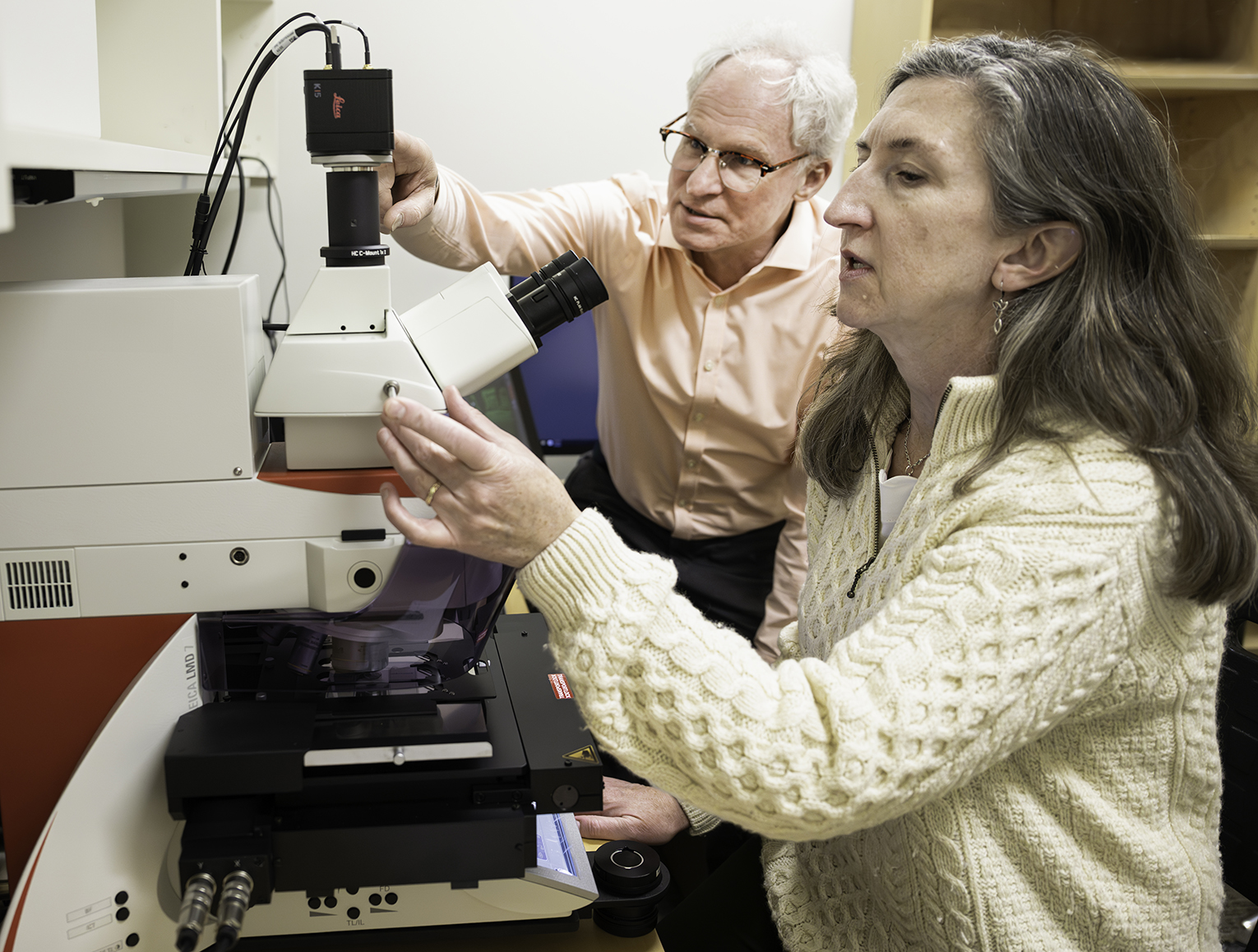 Photo of Brian G. Ayre and Roisin C. McGarry using the new laser microdissection system 